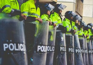 An image showing police for illustrating in this story you don't have to register your hands as deadly weapons with the police.