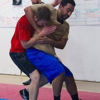 A headlock used to illustrate a hold common in krav maga training